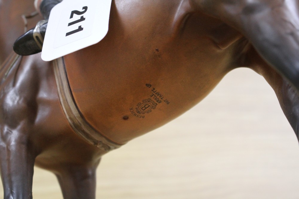 A Beswick model of Arkle with Pat Taaffe up, overall height 32cm